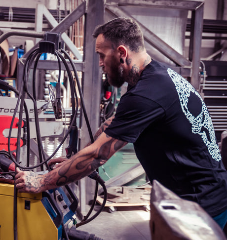 Man working on machinery in an industrial setting